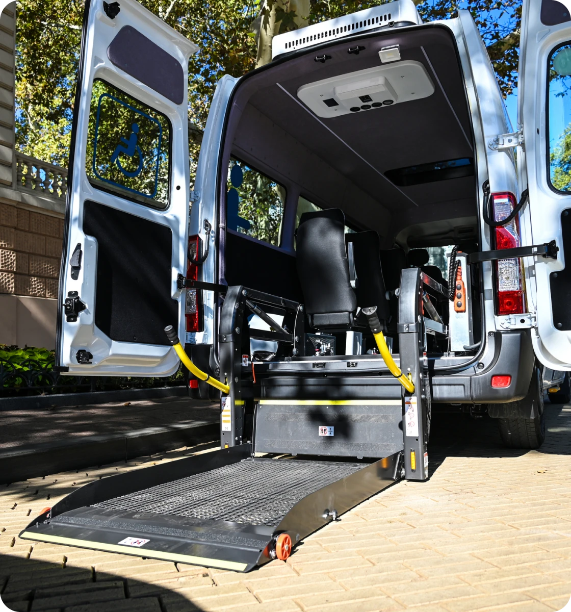 Van with wheelchair lift in action